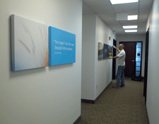 Careful art installtion in hallway